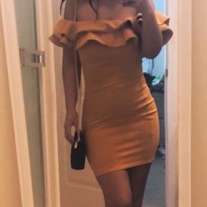 Form fitting off the shoulder dress